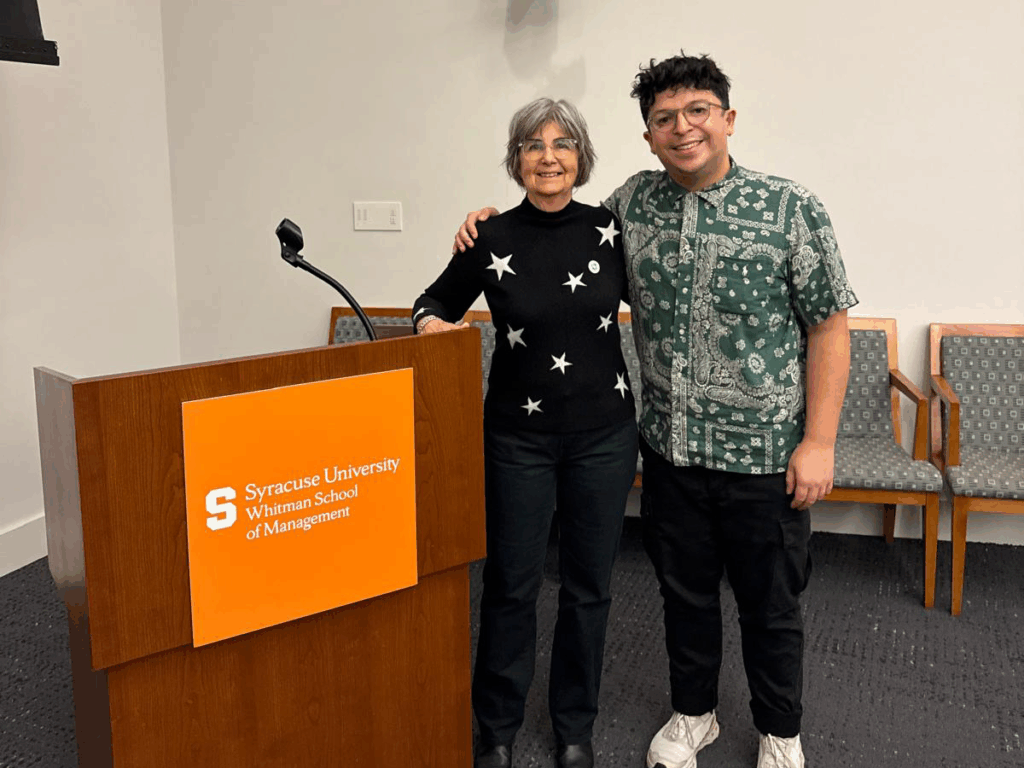 Katherine and Matt at the workshop preparing students with real-world booking education